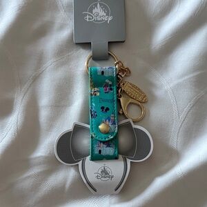 Disney Turquoise Keychain with Gold Details